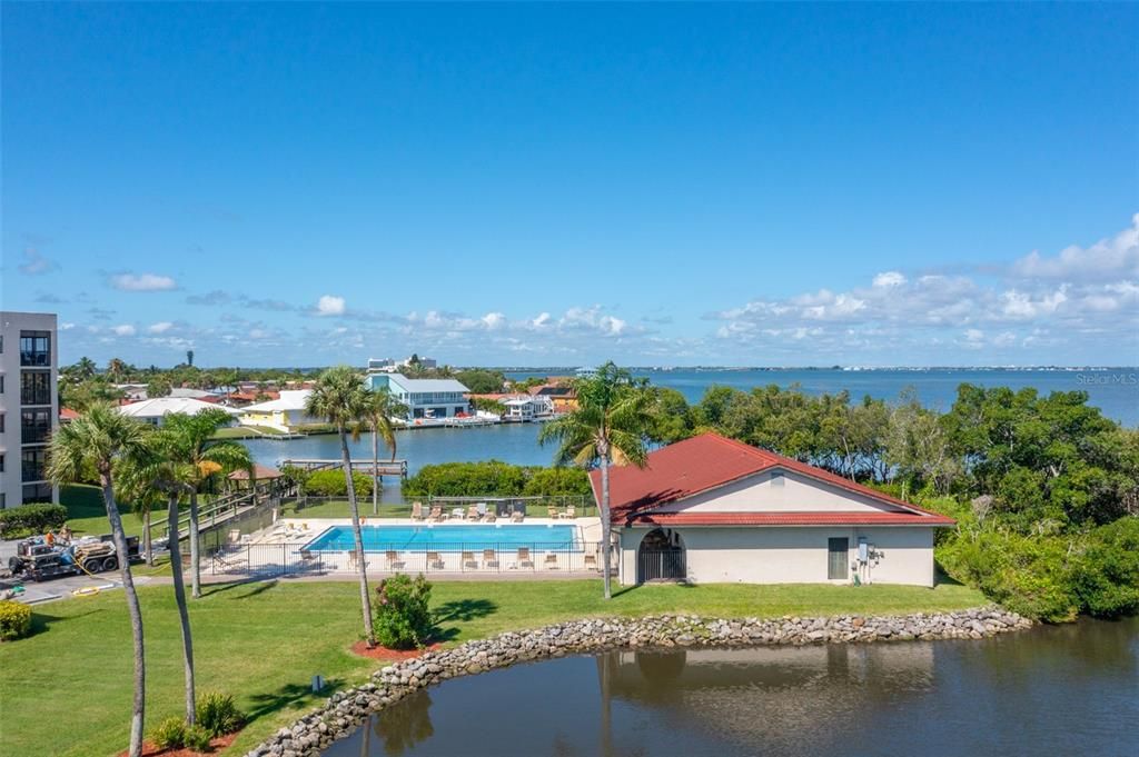 Pool and clubhouse area surrounded by water and wildlife!