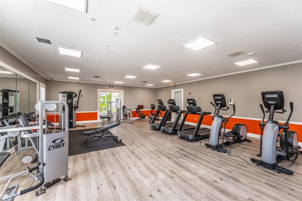 Fully equipped fitness center attached to playroom