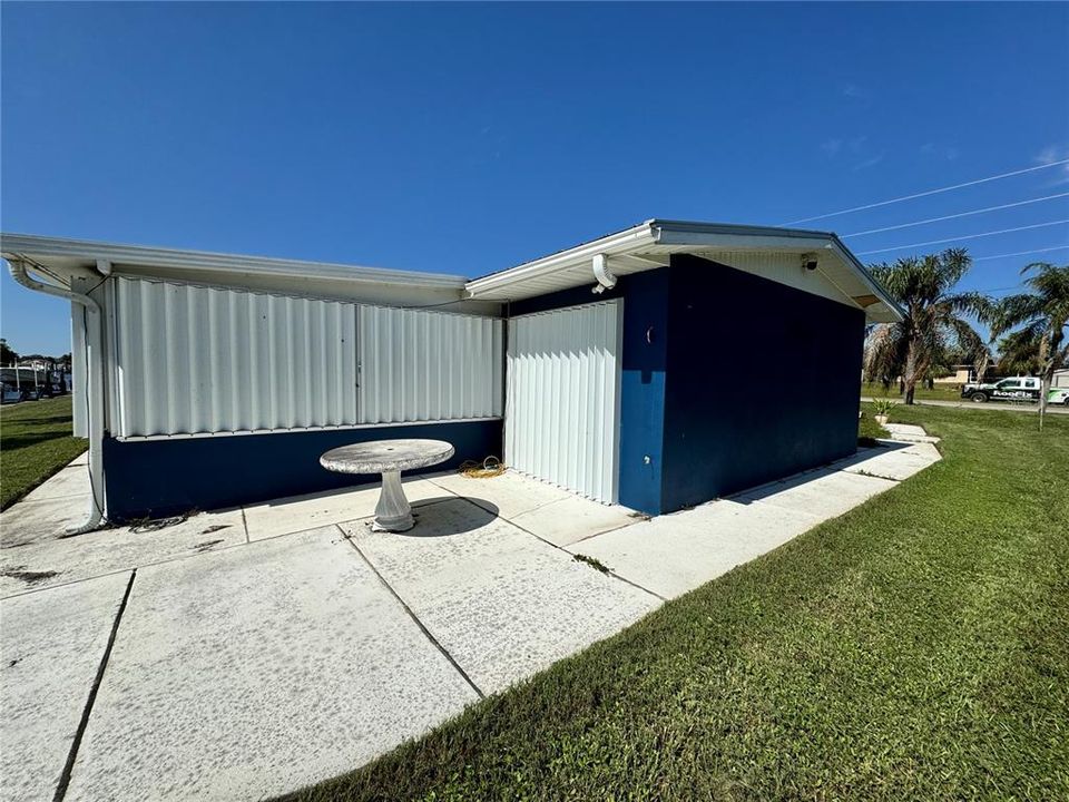 Rear of home with hurricane shutters