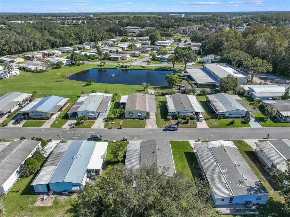 The new paver patio allows you to enjoy a large yard with plenty of green space or venture over to the catch and release pond and try your hand at fishing.