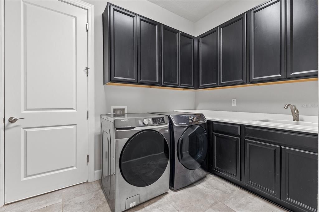 Laundry room with custom cabinets