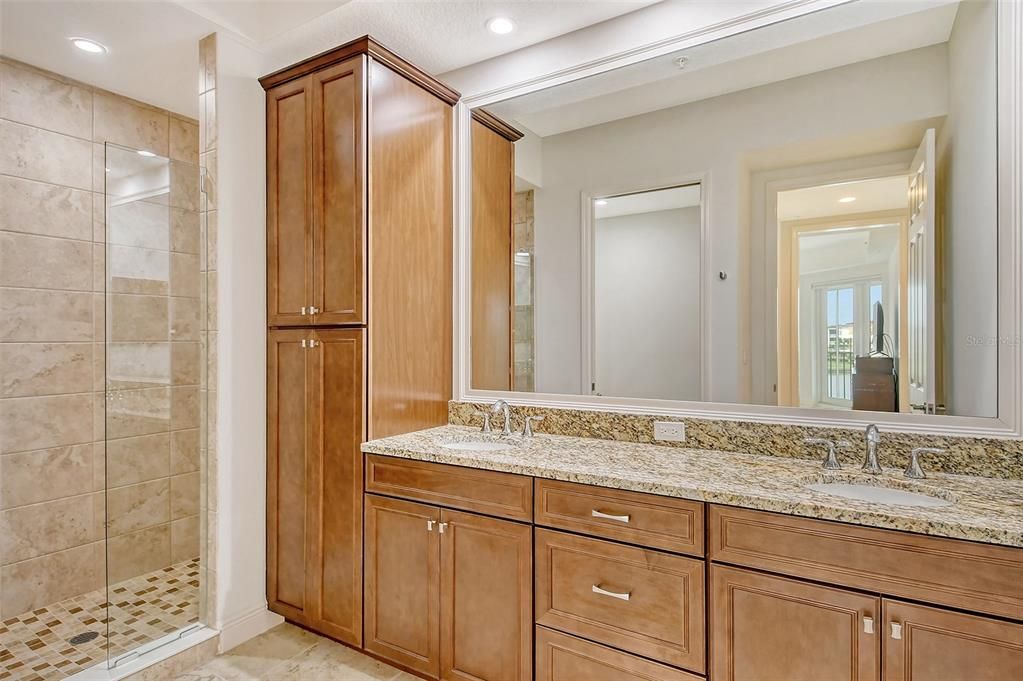 Primary bathroom with dual sinks.