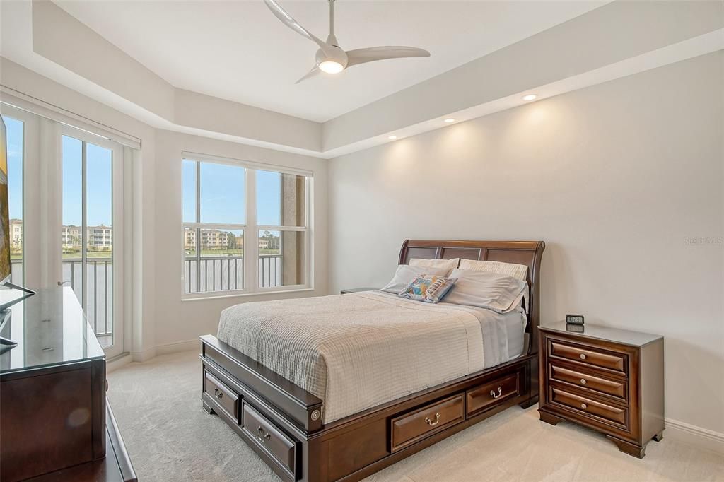 Primary bedroom with full lake views.