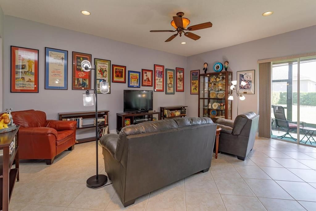 Family Room features tile floors and recessed lights