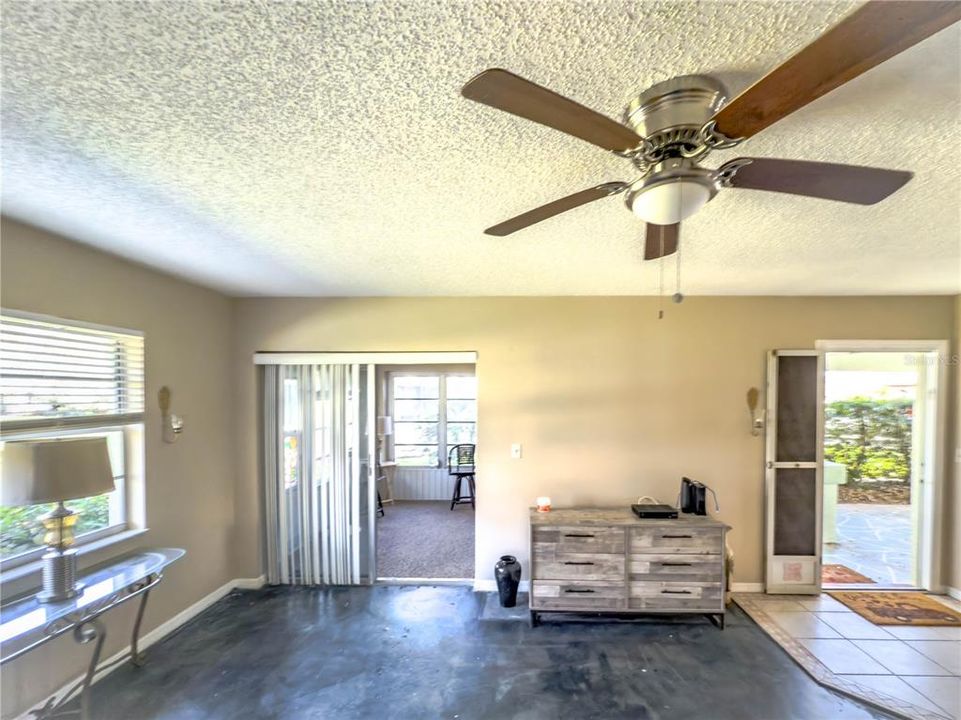 Living room, lanai on left, entry on right