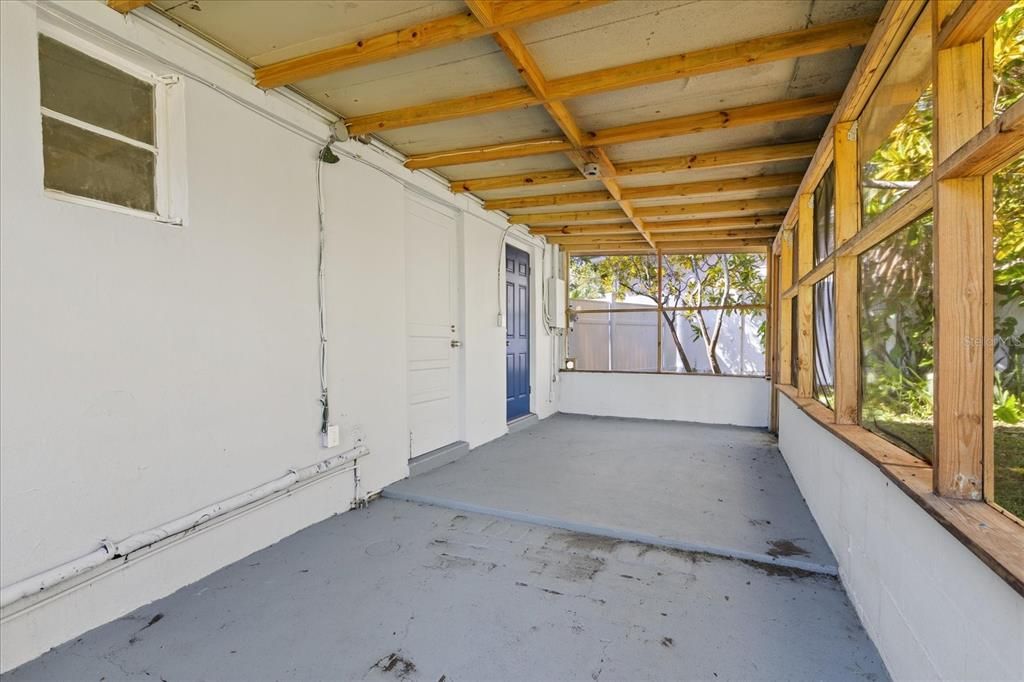 There is a screened porch on the back of the house