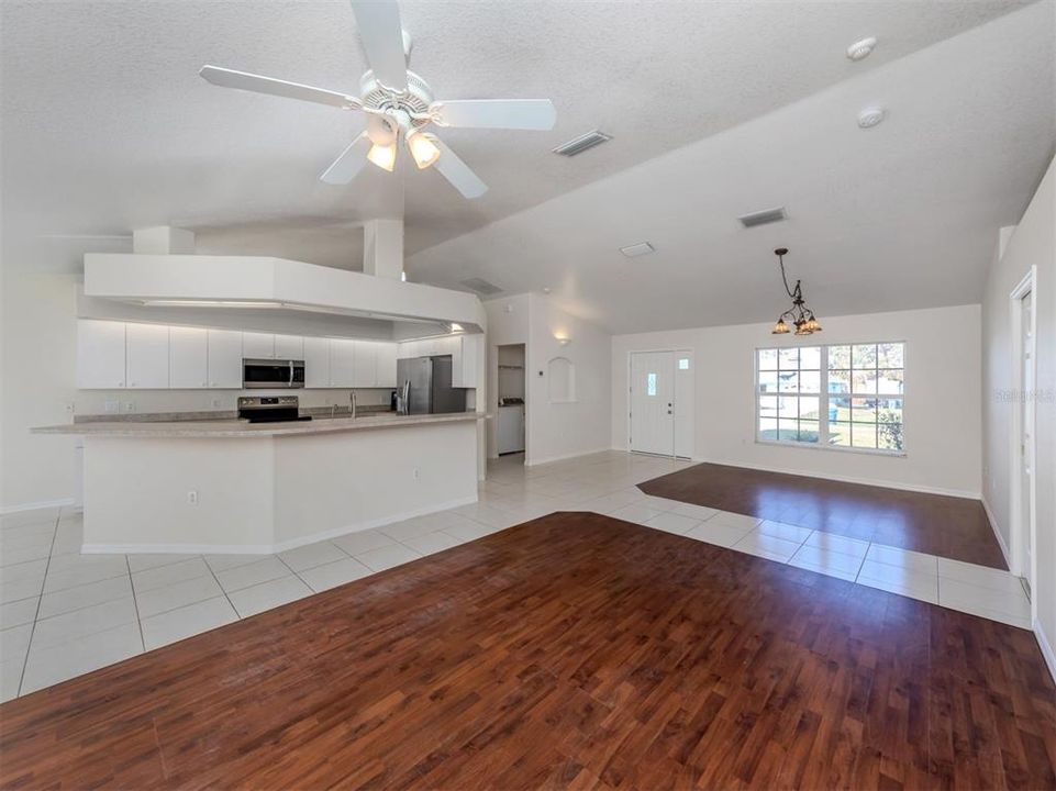 Kitchen breakfast bar and living area