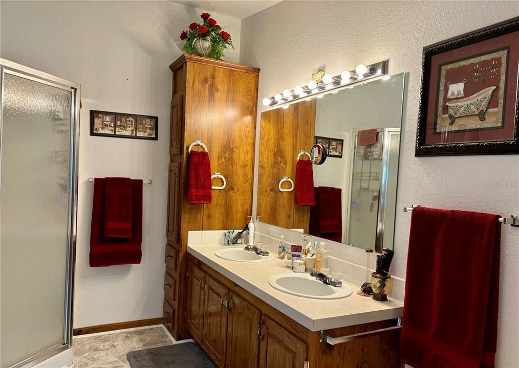 Primary Bathroom with double sinks and walk-in shower