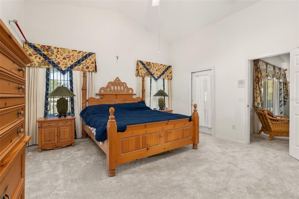 Primary Bedroom with private pool deck entry