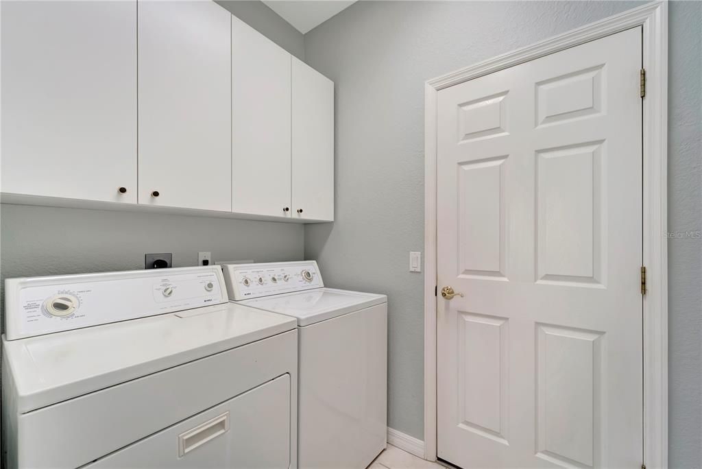 Laundry Room with Storage Cabinets.