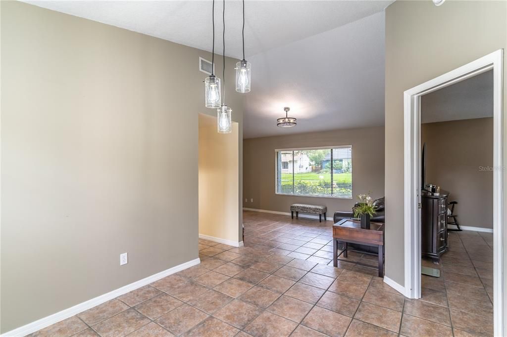 View dining room to the family room, primary off to the right, Kitchen off to the left