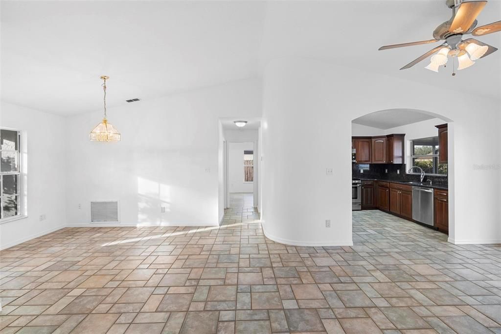 Living room facing kitchen/dining area