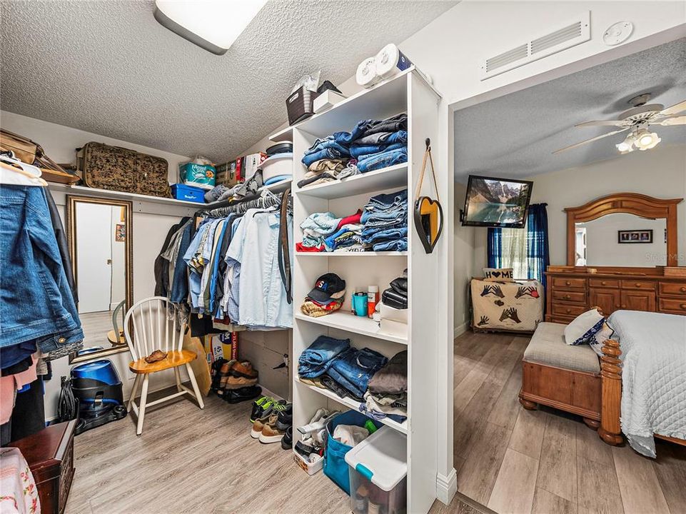 This is the primary bedroom walk-in closet