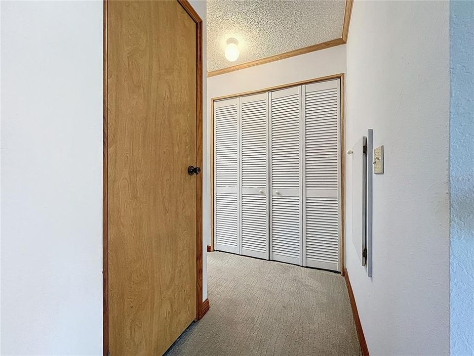 Hallway to laundry closet