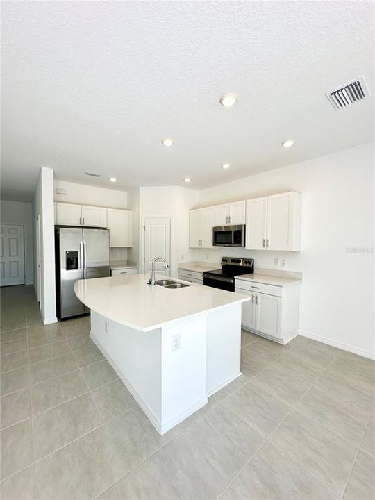 Kitchen w/Stainless Steel Appliances and Large Island