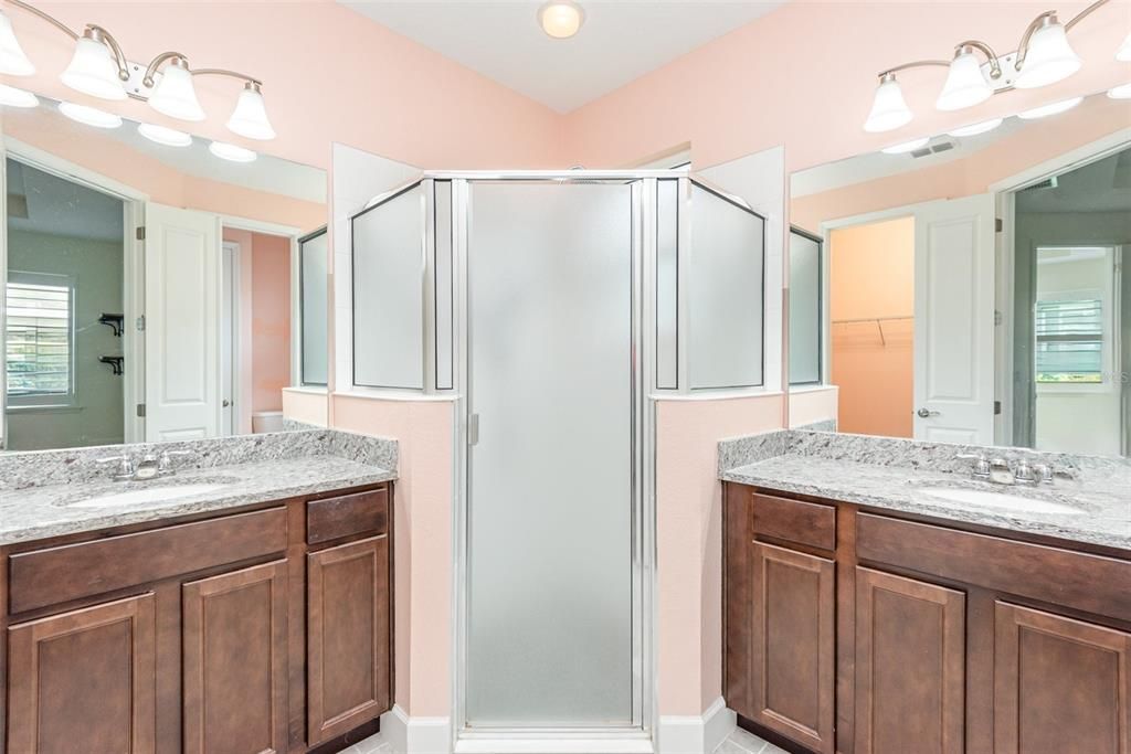 Primary bath with dual vanities & enclosed shower