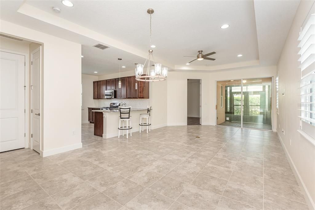 Living area overlooking the kitchen & backyard