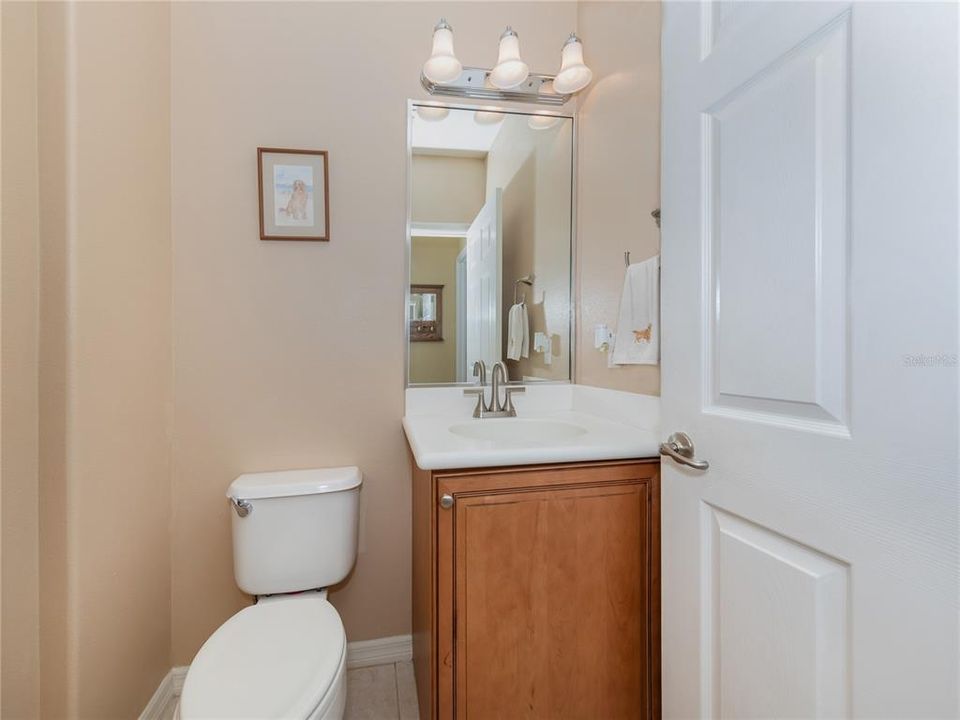 The first floor powder room is convenient for guests