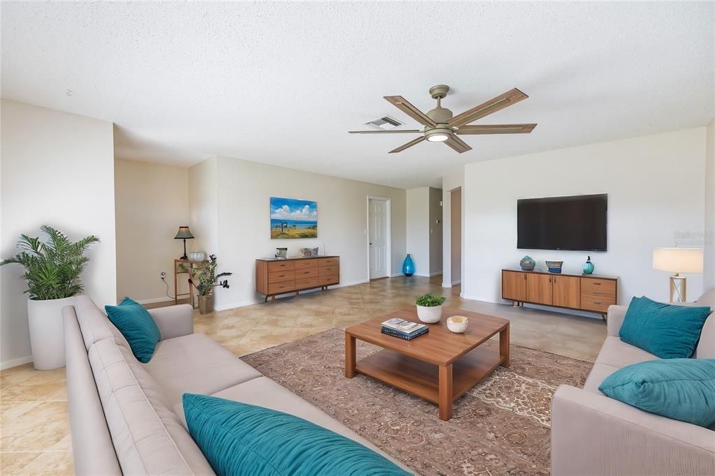 Virtually Staged Living Room looking into home.