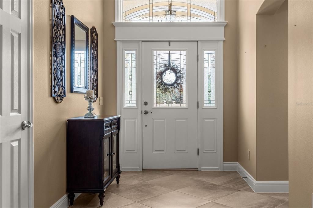 Step into the spacious foyer, where a coat closet provides convenient storage.