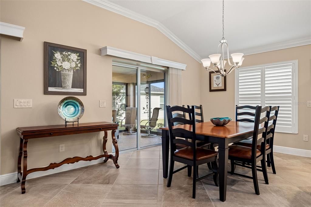 The cozy breakfast nook offers the perfect spot for casual dining and overlooks the large lanai.