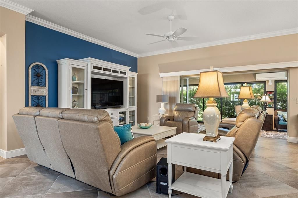 Spacious living room topped with Crown Molding!