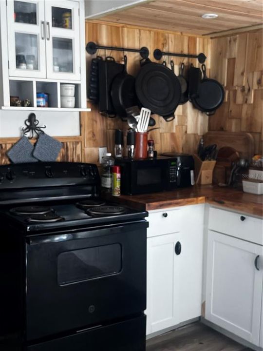 Kitchen with SS Refrigerator and stovve/oven