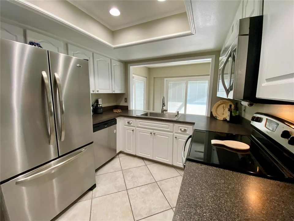 What a wonderful kitchen to whip up a meal! Open to Florida Room.