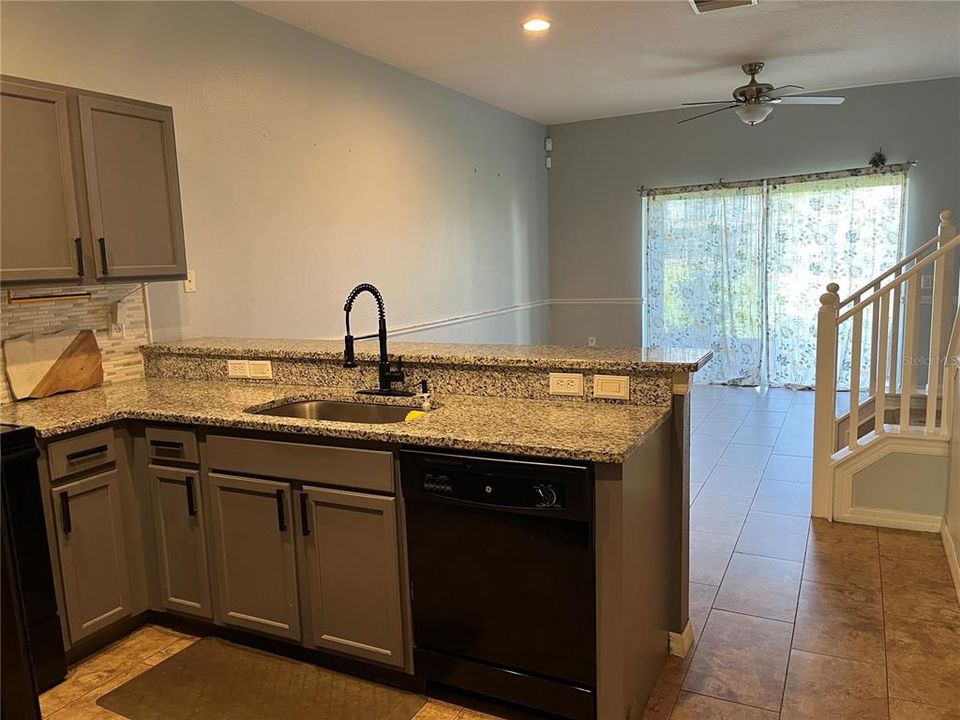 Beautiful tile floors in kitchen and family room