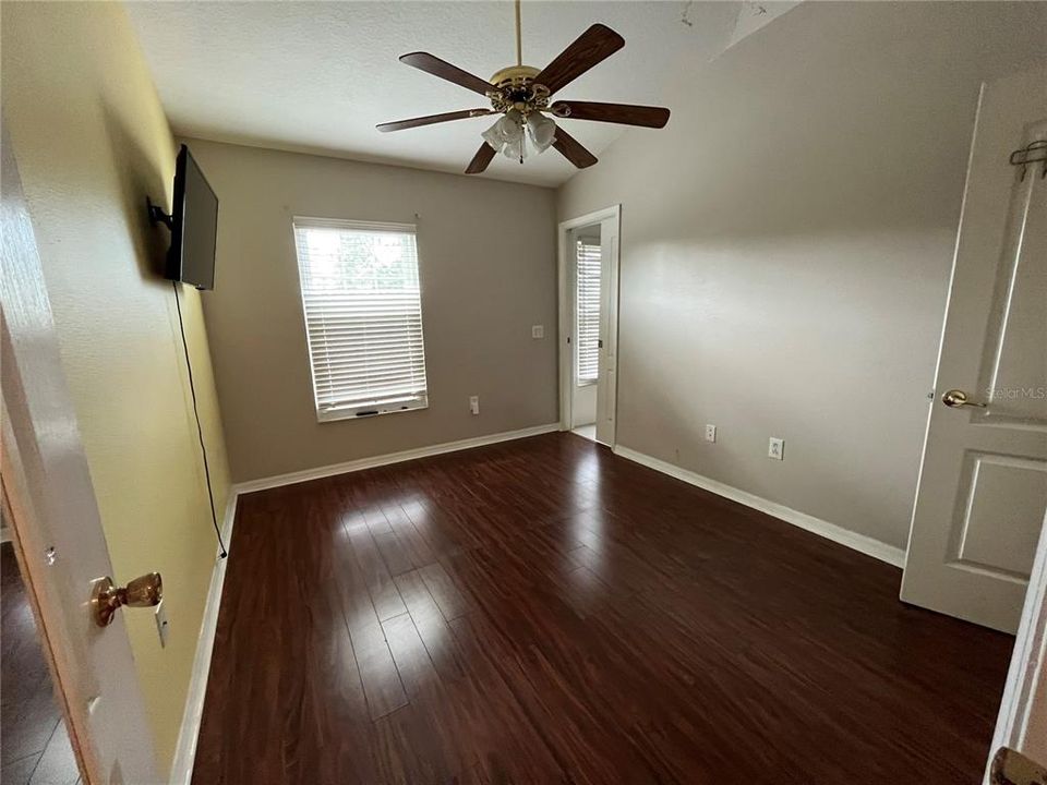 2nd bedroom with wood floors