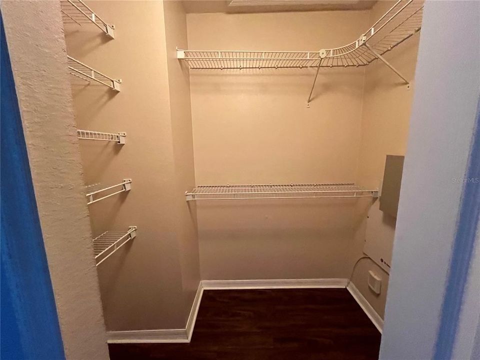 One of 2 primary bedroom closets