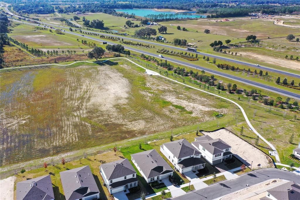 On one of the premier lots of the community this FEELS LIKE NEW /MOVE IN READY/BUILT 2023 Pulte home in Apopka’s Winding Meadows community is ready for a new owner!