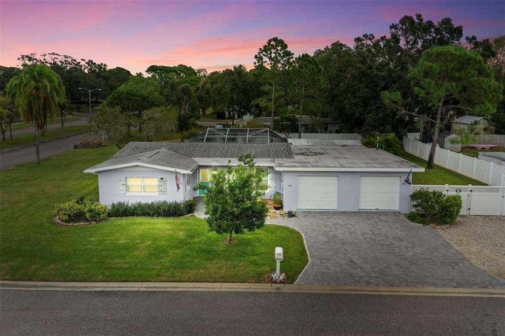 2053 Harvard Ave., Dunedin FL 3 Bed, 2 1/2 baths, pool, 2 car garage, off street Parking for 6+, RV and Boat parking, Huge lot and large screened lanai, completely fenced and golf cart friendly. Brand new paver driveway