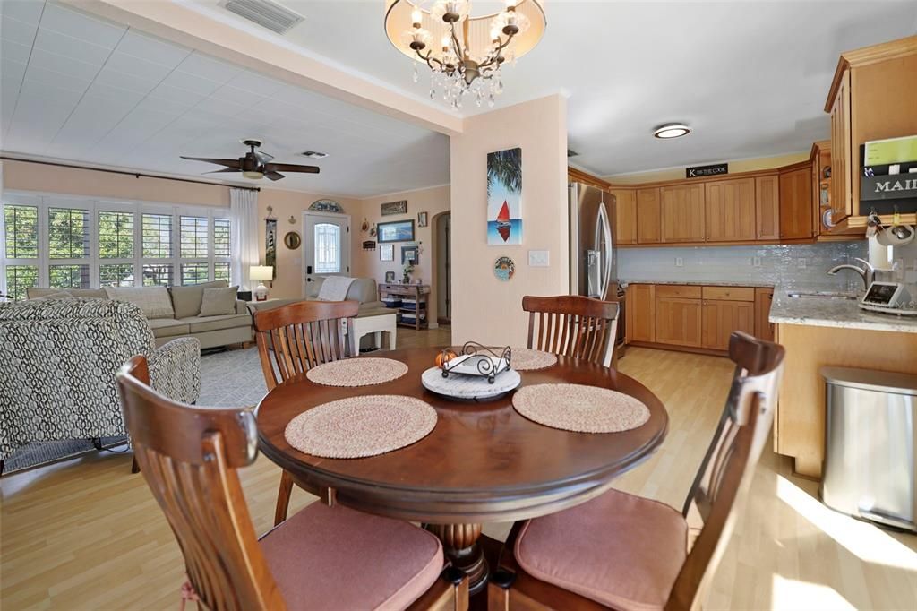 Dining area opens to kitchen and living area