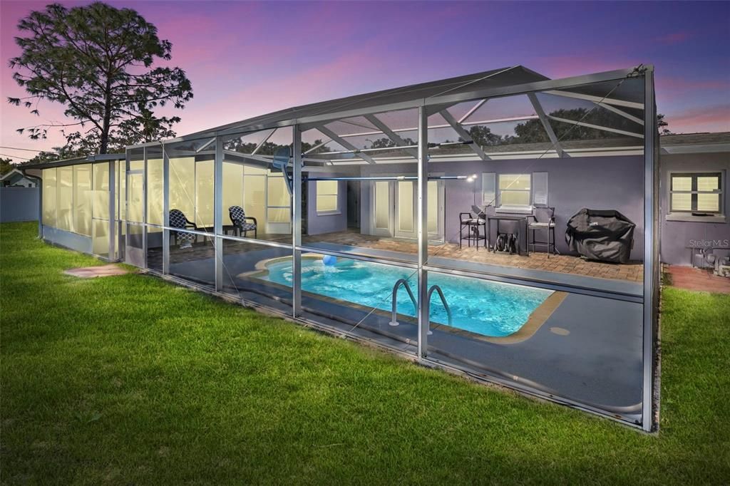 Screened Pool facing east. Perfect for afternoon swimming and relaxing