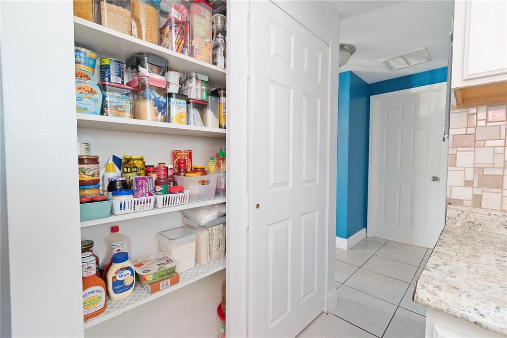 KITCHEN HAS A LARGE DOUBLE DOOR PANTRY