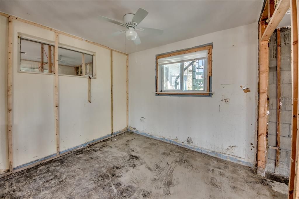 Spare room with ceiling fan