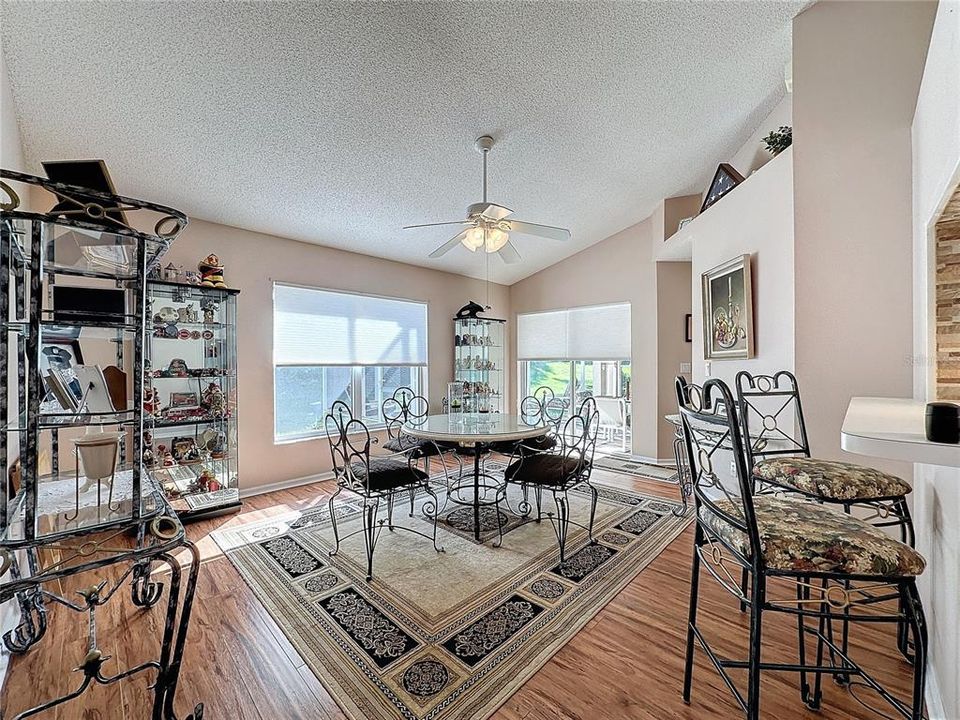 Dining room has laminate flooring