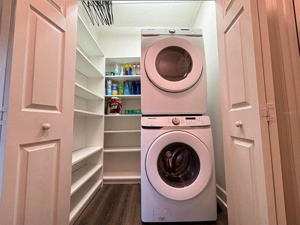 Laundry Room on first floor with extra space and shelving