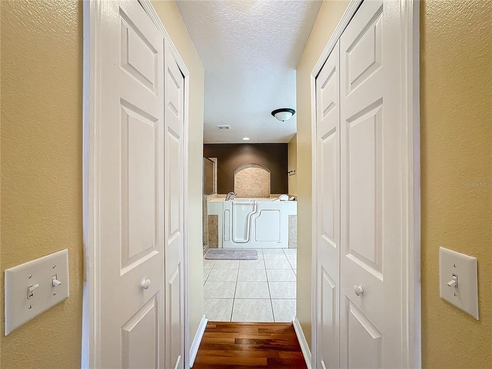 Master Bathroom with Double Walk in Closets