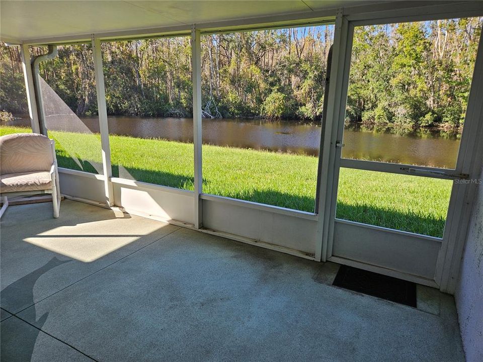 Screened Lanai overlooking the water