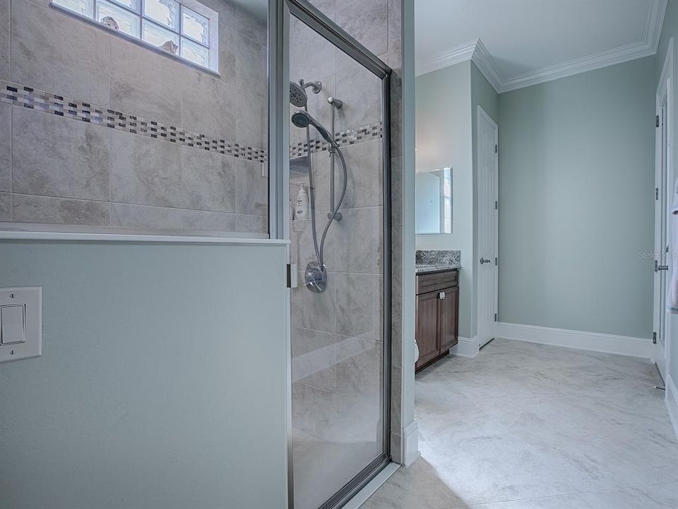 LINEN CLOSET TO THE LEFT AND THE DOOR TO THE RIGHT LEADS TO THE LANAI.