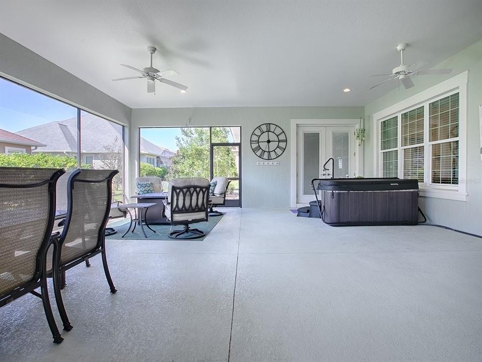 HOT TUB RIGHT OUTSIDE THE PRIMARY BEDROOM FRENCH DOORS.