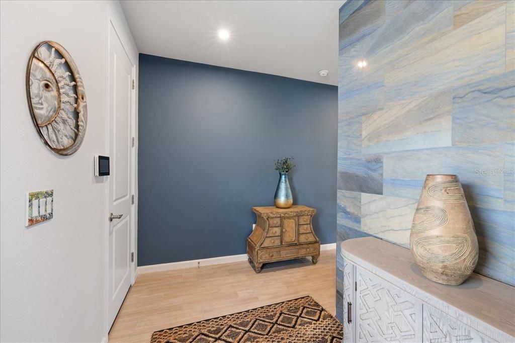 Entry way with storage closet and 2 car garage