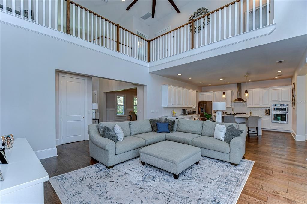 High ceiling makes this living area feel so spacious!