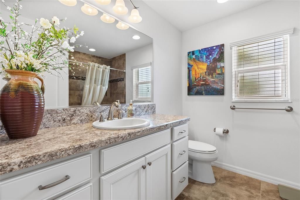 Guest bath with tile floors, Tiled shower/tub combo