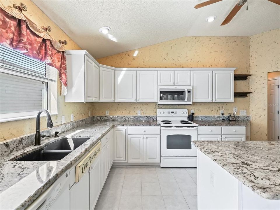 Close view showing kitchen cabinets