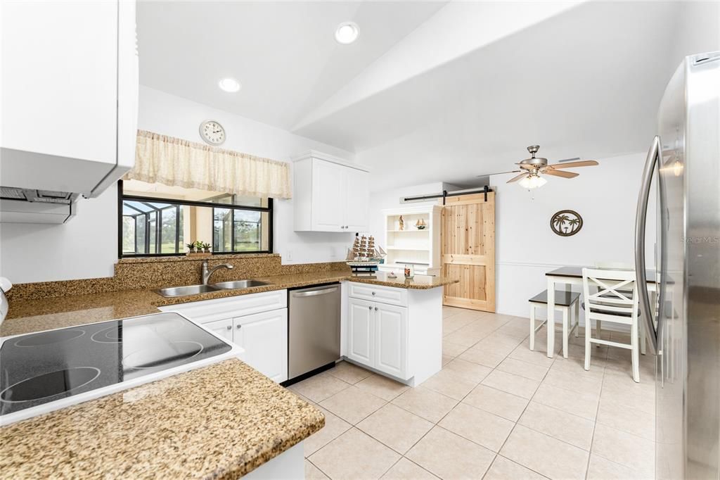 Smooth top range, stainless dishwasher & frig complete this Kitchen-with-a-view!