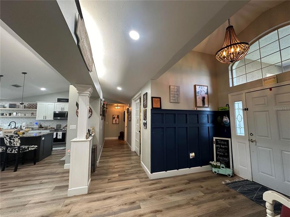 Foyer view down hall and into kitchen