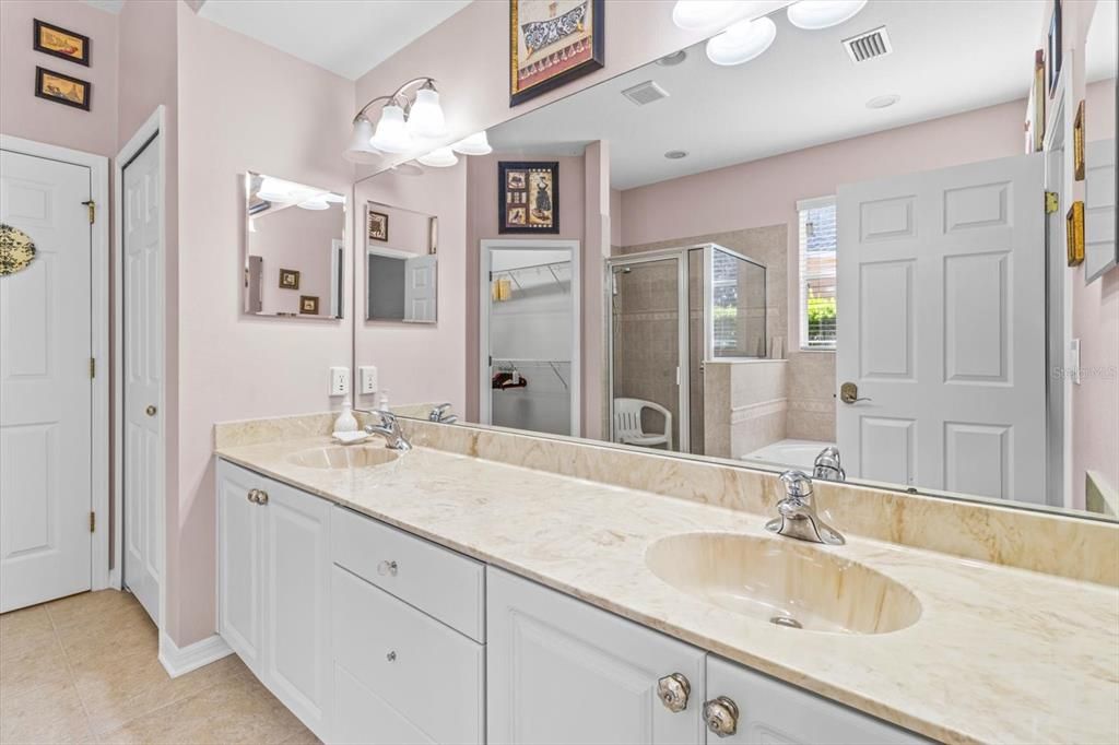 Master Bath includes secluded Water Closet, Garden/Jetted Tub; Large Walk In Shower; Dual Sinks, Access to Master Walk In Closet